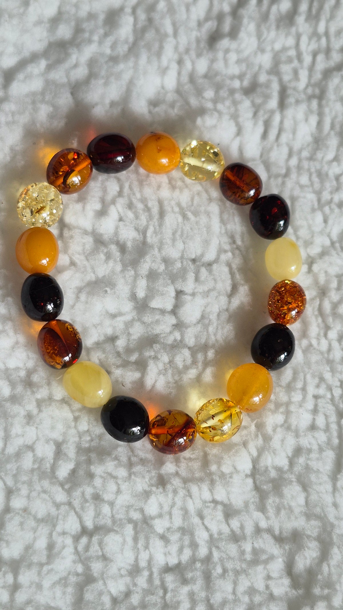 Polished Multicolour Baltic Amber Bracelet – Rounded Oval Beads