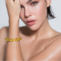 Genuine Baltic amber bead bracelet styled on a woman's wrist
