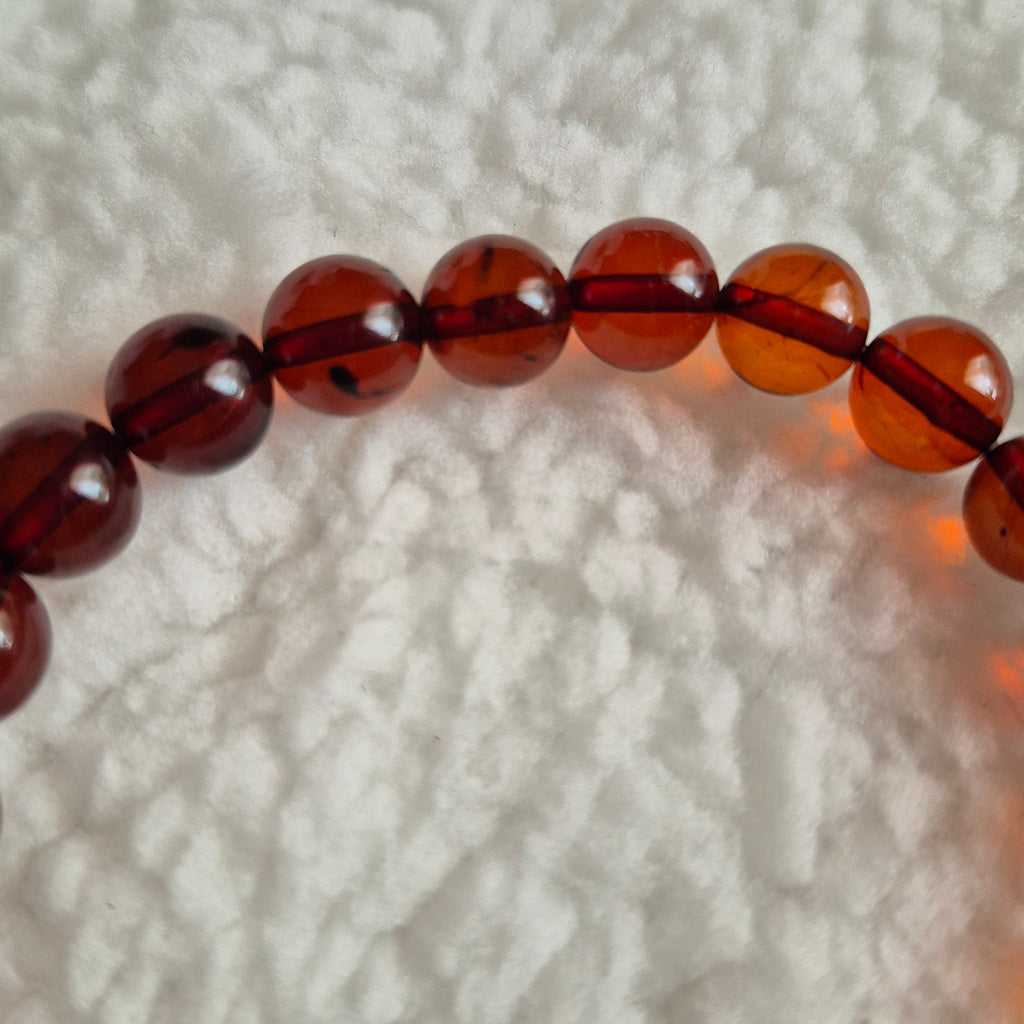Round polished Baltic amber beads